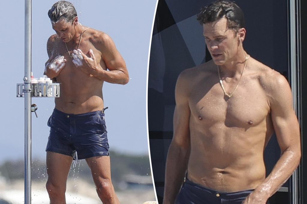 Shirtless Tom Brady rinses off in outdoor shower while yachting in Ibiza on Fourth of July