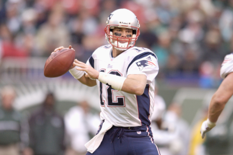 Tom Brady in a football game playing for Patriots
