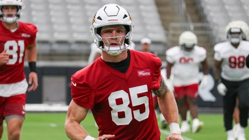 Cardinals TE Trey McBride looks on during training camp...