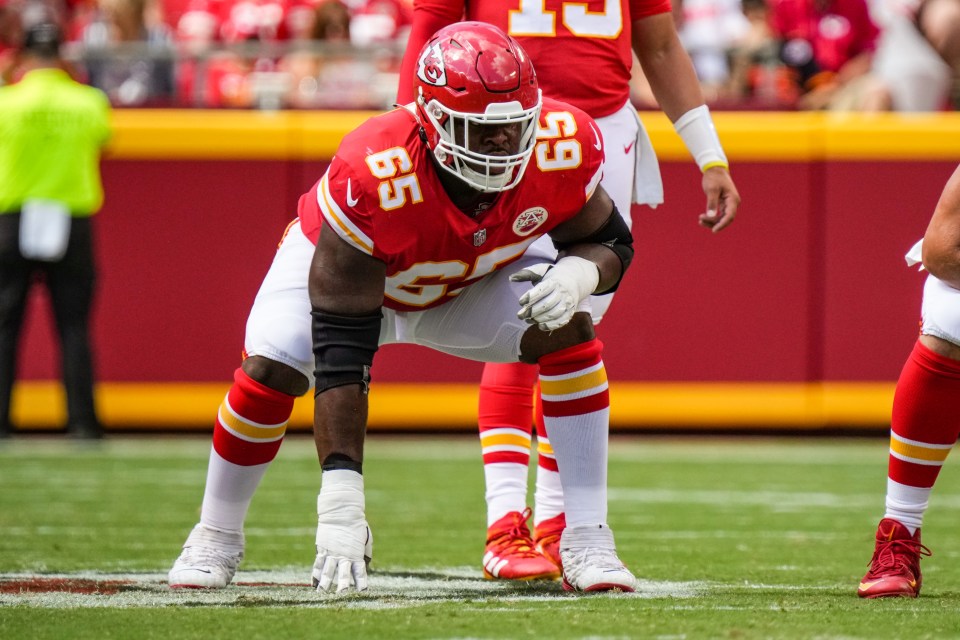 Trey Smith #65 of the Kansas City Chiefs at the line of scrimmage.