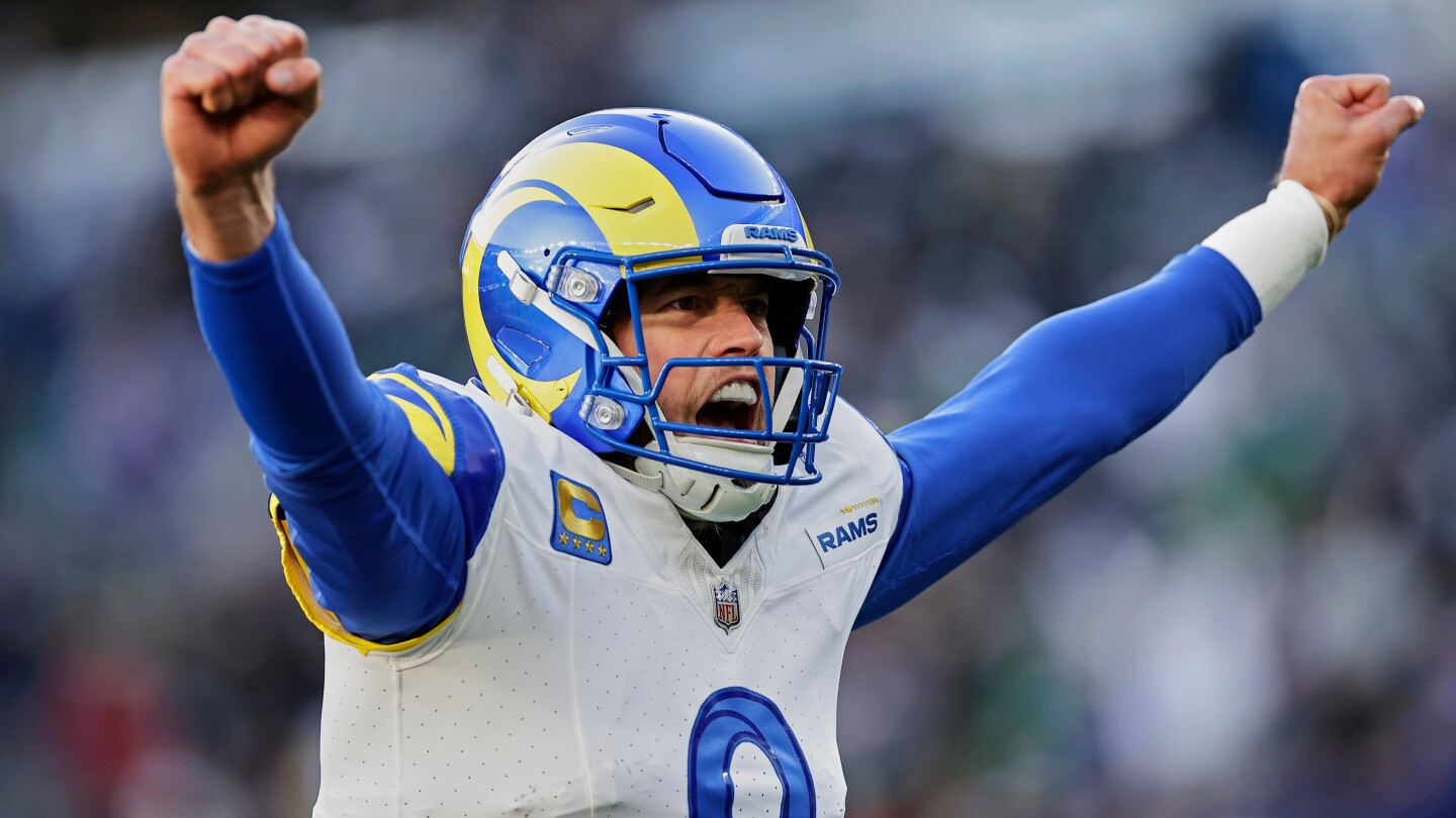 QB Matthew Stafford gets a restructured contract and agrees to stay with the Los Angeles Rams