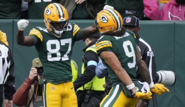 Doubs catches 2 TD passes in his return from a suspension to help Packers rout Cardinals 34-13