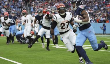 Cincinnati's Jordan Battle and Indy's Jonathan Taylor drop ball before goal line, negating TDs