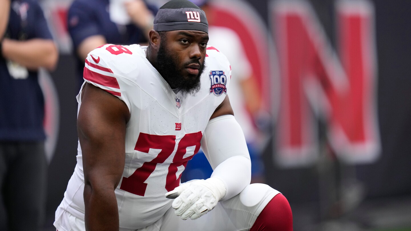 Giants put tackle Andrew Thomas on PUP list, sign safety K'Von Wallace