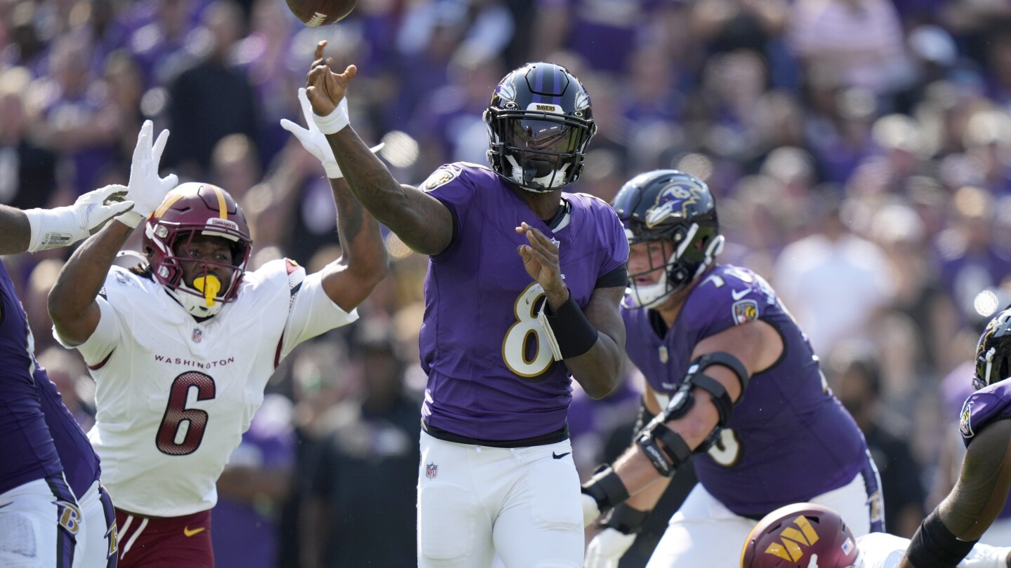 Jackson outduels Daniels and Henry runs for two TDs as Ravens beat Commanders 30-23