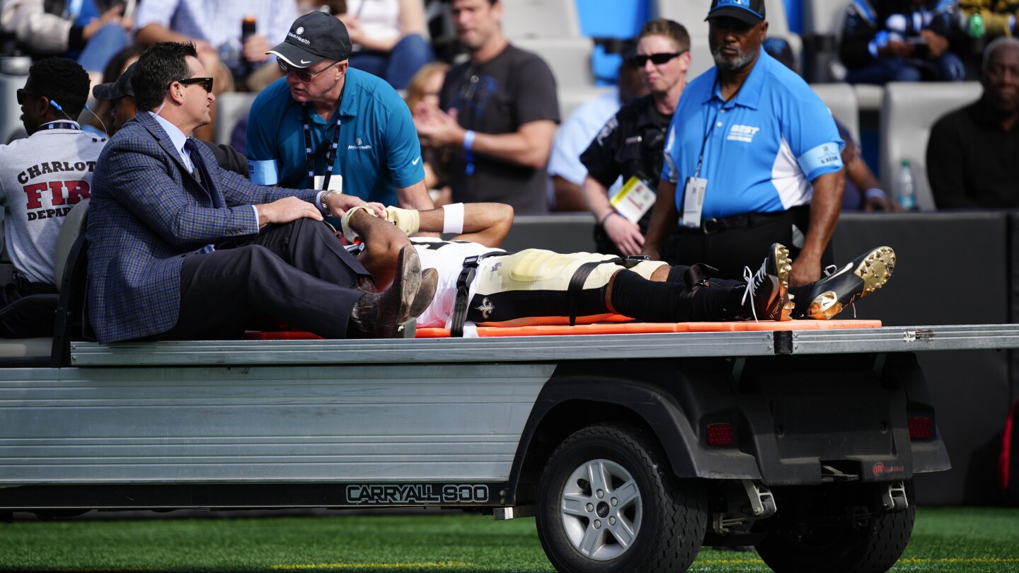 Saints WR Chris Olave discharged from hospital after concussion, to return to New Orleans with team