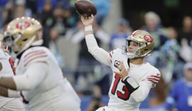Brock Purdy throws for 3 TDs and the 49ers beat the Seahawks 36-24 to move atop division