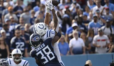 Joe Flacco throws two TD passes as the battered Colts beat the Titans 20-17