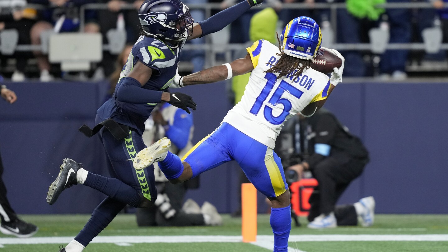 Demarcus Robinson's one-handed catch in OT gives Rams 26-20 win over Seahawks