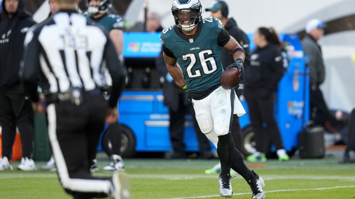 Barkley's brilliance helps Eagles beat Panthers 22-16 but pass game has Philly frustrated