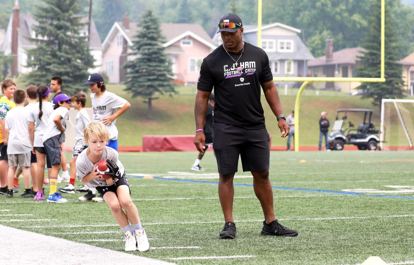 Homecoming for Ham with annual youth football camp - Duluth News Tribune