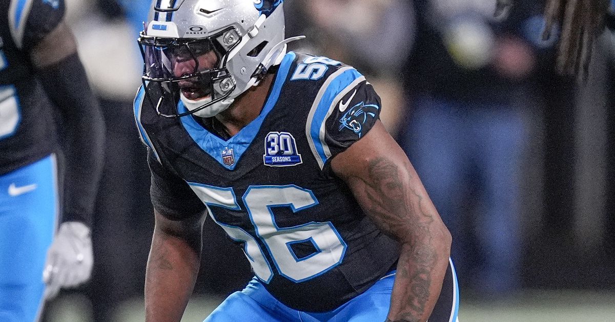 Trevin Wallace is taking guidance from two former Panthers linebacker greats