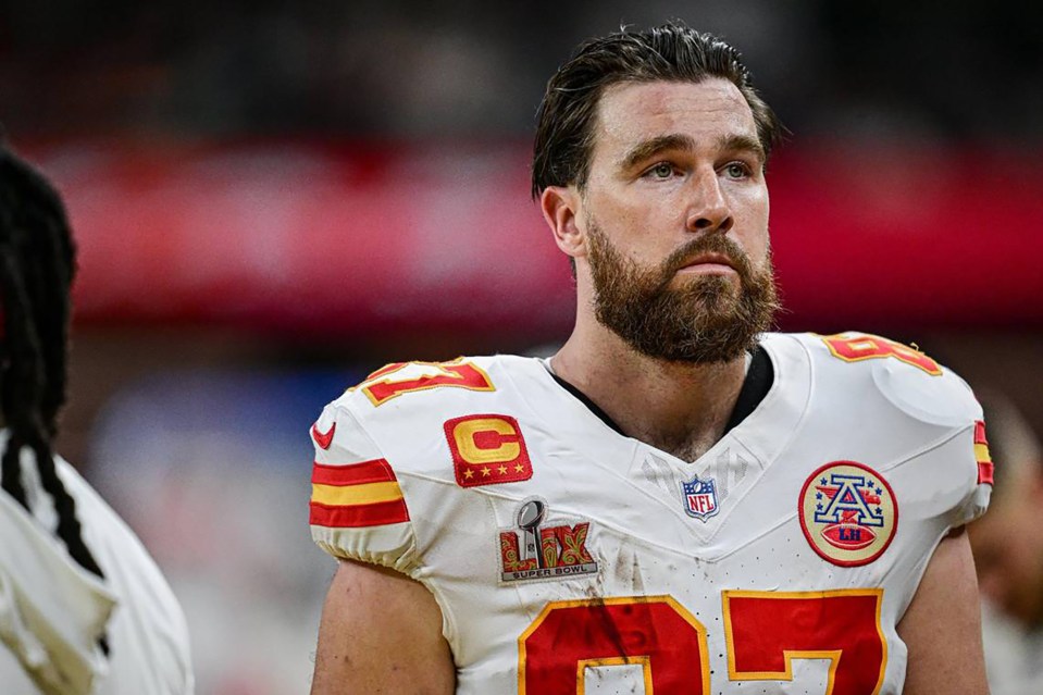 Travis Kelce, Kansas City Chiefs tight end, walks off the field after Super Bowl LIX.