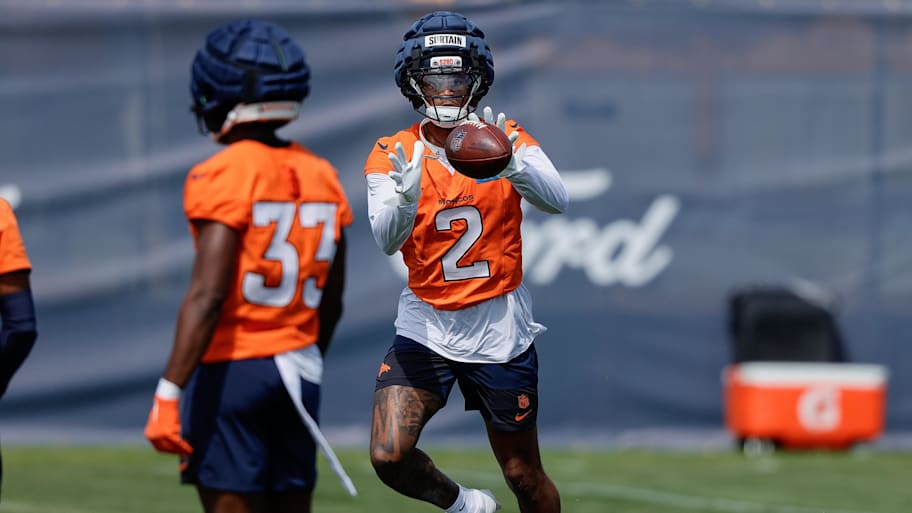 Denver Broncos cornerback Pat Surtain II (2) catches a pass during training camp practice.