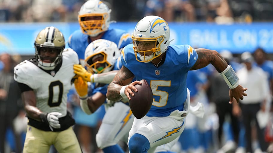 Trey Lance scrambles during the preseason