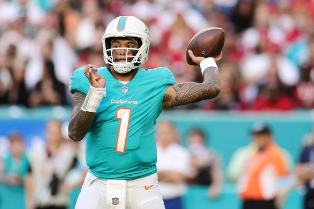 Tua Tagovailoa #1 of the Miami Dolphins looks to pass against the San Francisco 49ers at Hard Rock Stadium on December 22, 2024 in Miami Gardens, Florida