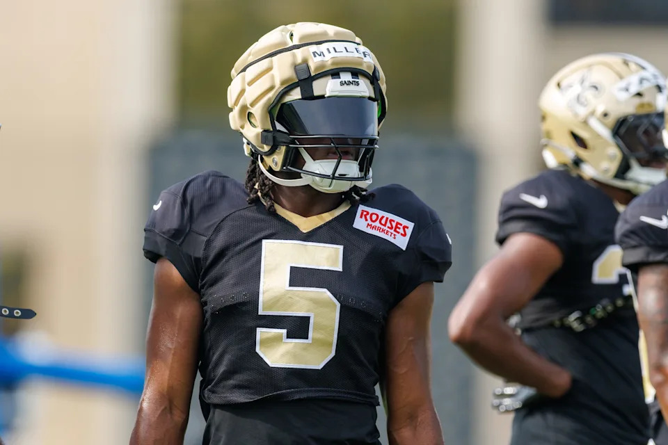 Jul 30, 2025; New Orleans, LA, USA; New Orleans Saints running back Kendre Miller (5) looks on during training camp at Ochsner Sports Performance Center. Mandatory Credit: Stephen Lew-Imagn Images