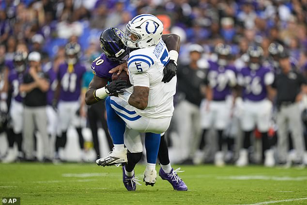 Indianapolis Colts quarterback Anthony Richardson Sr. (5) is sacked by Baltimore Ravens linebacker David Ojabo (90) during Thursday's preseason opener