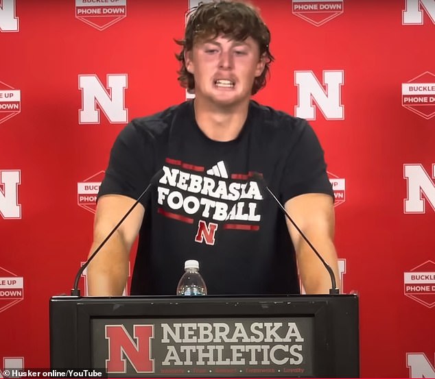 College football star breaks down in tears after being caught off-guard by reporter's question at press conference
