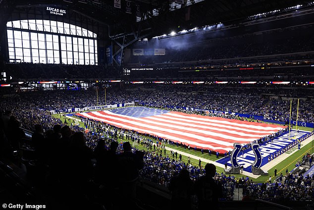 The window wall is shown from the inside of the stadium before an NFL game in January