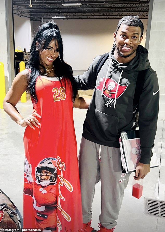 Pilar Sanders turned heads once again as she attended her son Shilo's (right) NFL debut