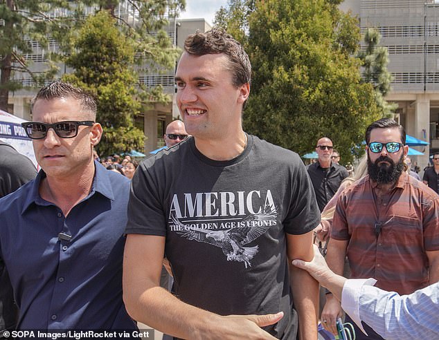 Charlie Kirk (center) has described civil rights icon Martin Luther King Jr. as 'awful'