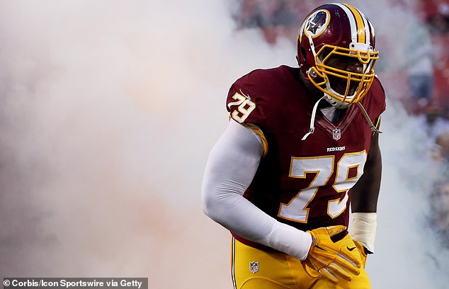 Robertson, who works as South Carolina's defensive line coach, previously played in the NFL