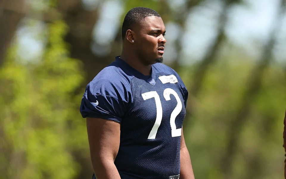 LAKE FOREST, ILLINOIS - MAY 11: Kiran Amegadjie #72 of the Chicago Bears looks on during Chicago Bears Rookie Minicamp at Halas Hall on May 11, 2024 in Lake Forest, Illinois. (Photo by Michael Reaves/Getty Images)