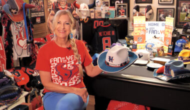 The Texans fan behind head-turning hats