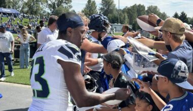 New Seahawks safety D&#x002019;Anthony Bell, formerly with the Cleveland Browns, signs autographs for young fans following the fourth practice of Seattle&#x002019;s NFL training camp Saturday, July 26, 2025, at the Virginia Mason Athletic Center in Renton.