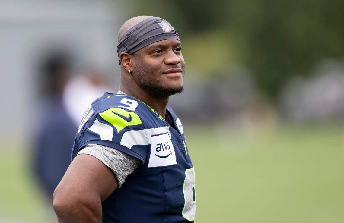 Seattle Seahawks running back Kenneth Walker III (9) warms up during training camp at Virginia Mason Athletic Center on Friday, July 25, 2025, in Renton, Wash.