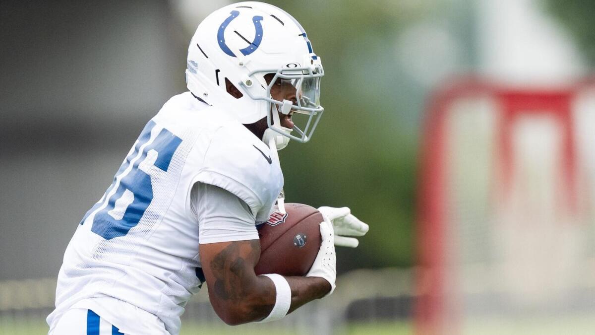 Colts RB Salvon Ahmed carted off field with severe leg injury following hip-drop tackle