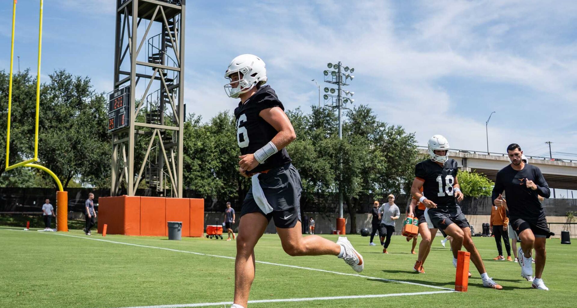 Texas quarterback Arch Manning (16) runs across the field between drills during a Texas Football practice at the Frank Denius Fields in Austin, July 30, 2025.