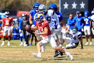 Los Angeles Rams quarterback Stetson Bennett IV (13) finds room to run against the Dallas...