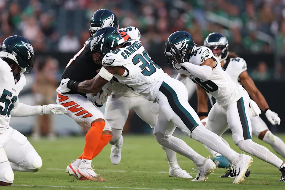Running back Chase Brown is stood up Eagles linebacker Jihaad Campbell during the preseason game Aug. 7. Brown was one of the more impressive players during camp work on Aug. 10.