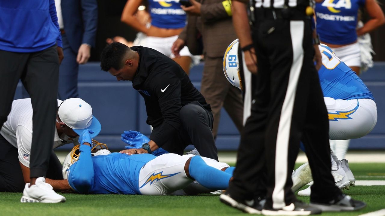 Chargers WR Quentin Johnston leaves field on cart after big hit on 3rd snap vs Rams