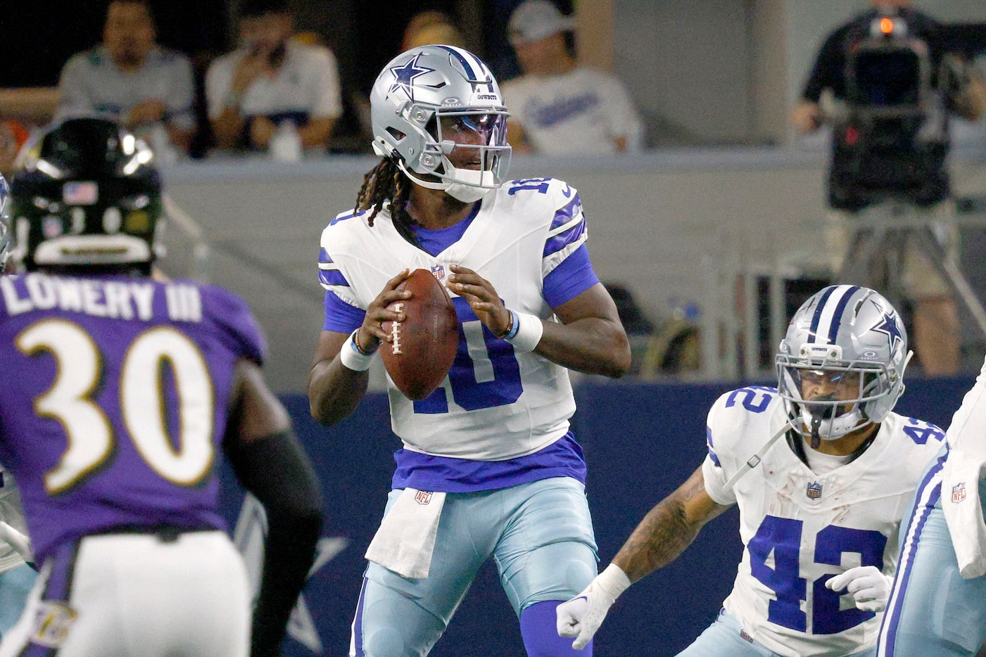 Dallas Cowboys quarterback Joe Milton III (10) looks to throw the ball against the Baltimore...
