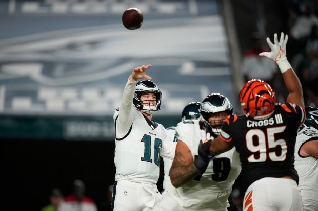 Eagles quarterback Tanner McKee passes during the first half of a preseason game the Cincinnati Bengals Thursday night. McKee did not practice Tuesday because an injury to a finger on his throwing hand. (AP Photo/Matt Slocum)