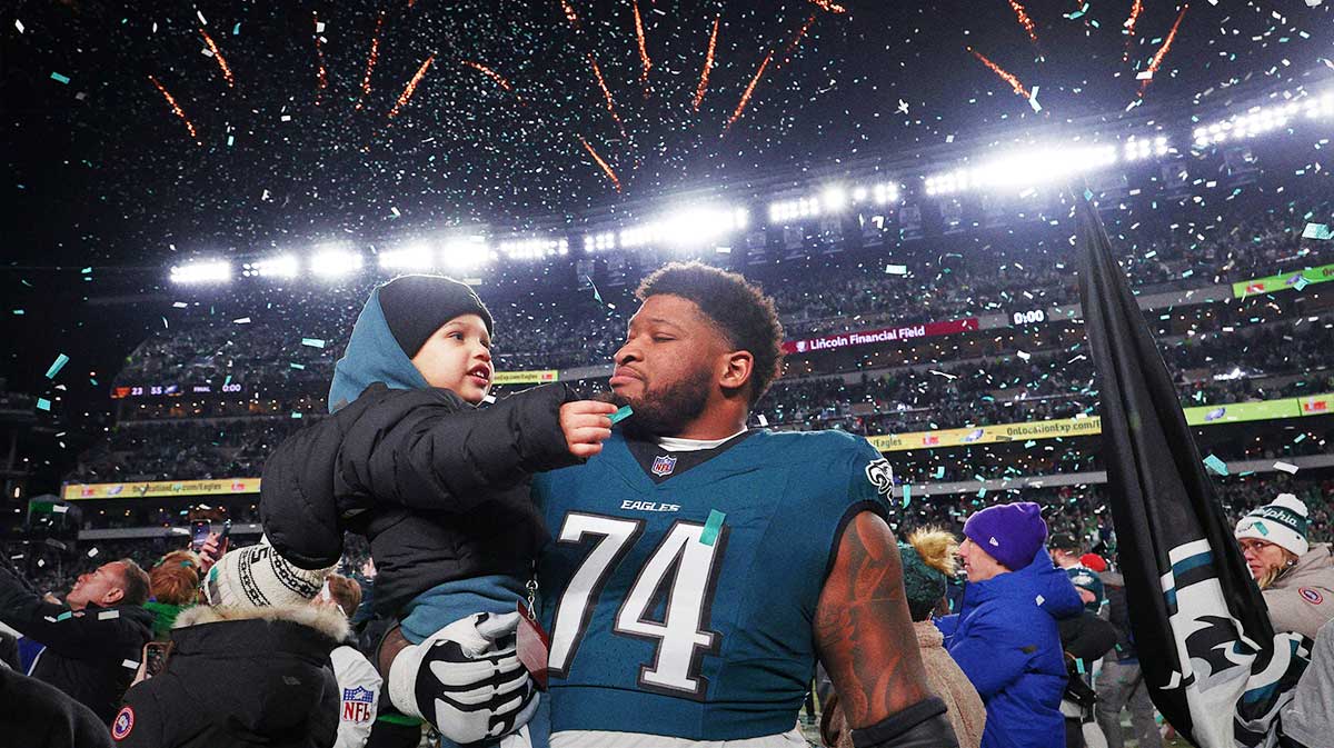 Philadelphia Eagles offensive tackle Fred Johnson (74) celebrate after winning the NFC Championship game against the Washington Commanders at Lincoln Financial Field.