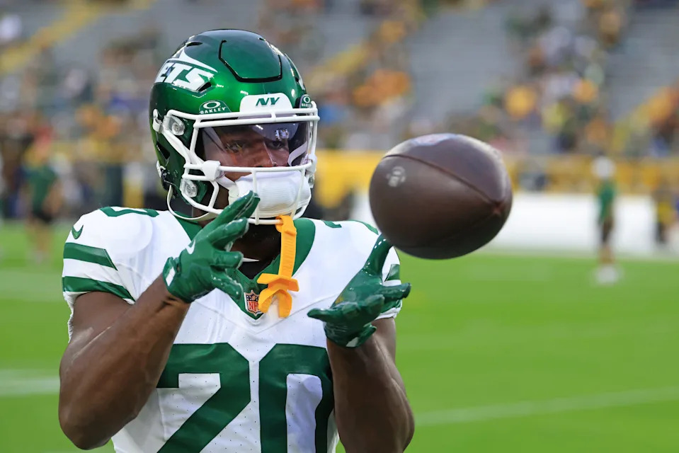 GREEN BAY, WISCONSIN - AUGUST 09: Breece Hall #20 of the New York Jets warms up prior to the game against the Green Bay Packers during the NFL Preseason 2025 game between New York Jets and Green Bay Packers at Lambeau Field on August 09, 2025 in Green Bay, Wisconsin. (Photo by Justin Casterline/Getty Images)