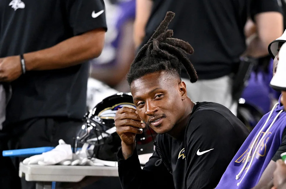 BALTIMORE, MARYLAND - AUGUST 07: DeAndre Hopkins #10 of the Baltimore Ravens watches the game against the Indianapolis Colts during the NFL Preseason 2025 game at M&T Bank Stadium on August 07, 2025 in Baltimore, Maryland. (Photo by G Fiume/Getty Images)