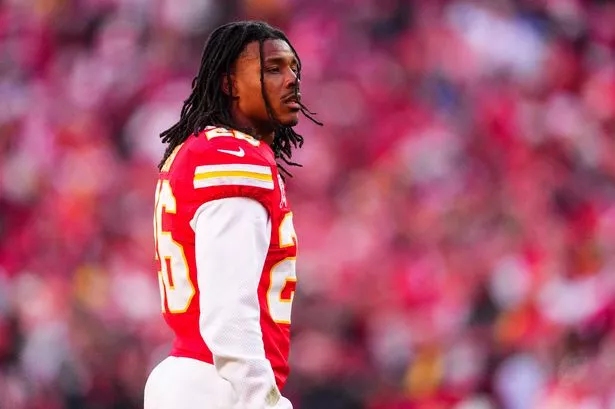 Deon Bush #26 of the Kansas City Chiefs looks on from the field during an NFL football game against the Houston Texans at GEHA Field at Arrowhead Stadium on December 21, 2024 in Kansas City, Missouri.