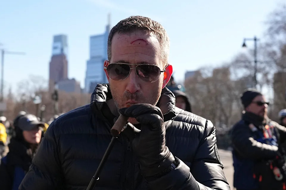 PHILADELPHIA, PENNSYLVANIA - FEBRUARY 14: General manager Howie Roseman of the Philadelphia Eagles attempts to light his cigar during the Philadelphia Eagles Super Bowl Championship Parade on February 14, 2025 in Philadelphia, Pennsylvania. (Photo by Mitchell Leff/Getty Images)Mitchell Leff&sol;Getty Images