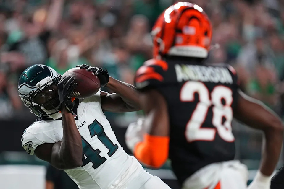 PHILADELPHIA, PENNSYLVANIA - AUGUST 7: Darius Cooper #41 of the Philadelphia Eagles catches a touchdown pass against Tycen Anderson #26 of the Cincinnati Bengals in the first half of the NFL Preseason 2025 game at Lincoln Financial Field on August 7, 2025 in Philadelphia, Pennsylvania. (Photo by Mitchell Leff/Getty Images)