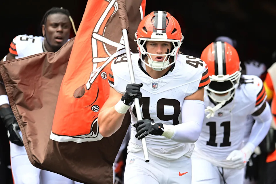 Aug 23, 2025; Cleveland, Ohio, USA; Cleveland Browns linebacker Carson Schwesinger (49) leads the team onto the field before the game between the Browns and the Los Angeles Rams at Huntington Bank Field. Mandatory Credit: Ken Blaze-Imagn Images
