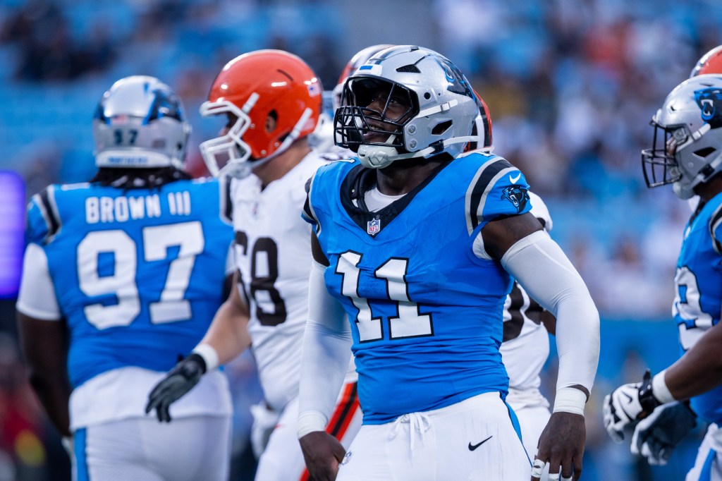 Carolina Panthers linebacker Nic Scourton (11) celebrates during the second quarter against the Cleveland Browns at Bank of America Stadium.