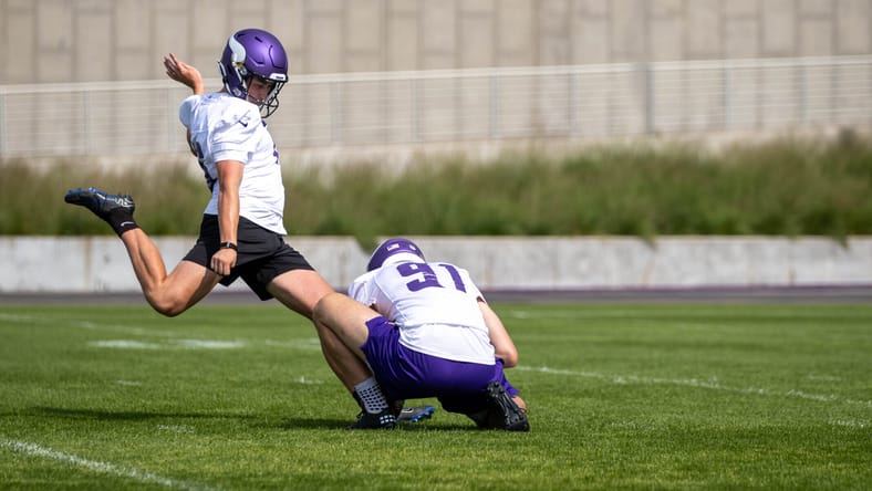 Oscar Chapman holding for Will Reichard - Minnesota Vikings training camp