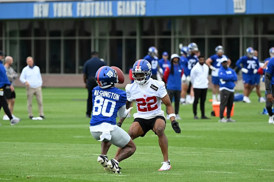 Montrell Washington and Dre Phillips (22) practice during OTA’s in East Rutherford, N.J. Bill Kostroun/New York Post
