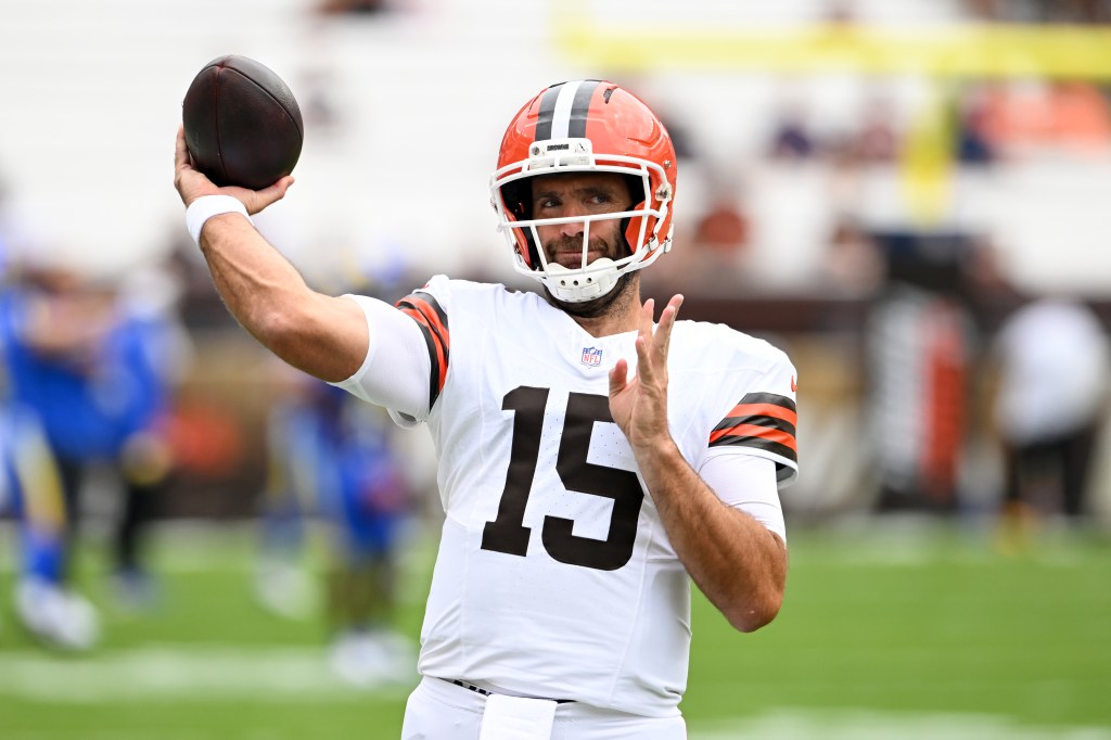 Cleveland Browns quarterback preparing to throw the football.