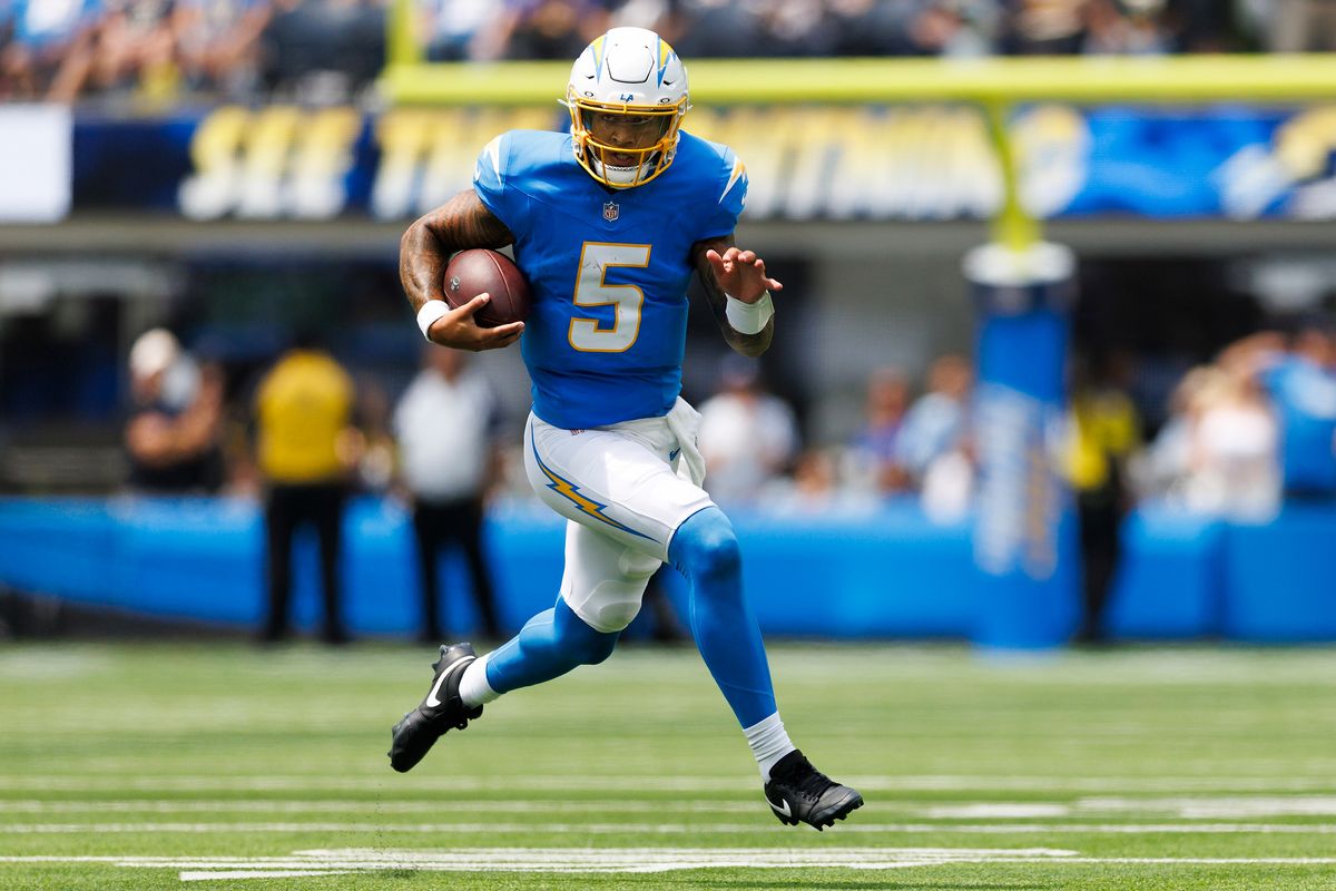 Trey Lance #5 of the Los Angeles Chargers runs with the ball during the first half against the New Orleans Saints at SoFi Stadium on August 10, 2025 in Inglewood, California. Trey Lance #5 of the Los Angeles Chargers runs with the ball during the first half against the New Orleans Saints at SoFi Stadium on August 10, 2025 in Inglewood, California.
